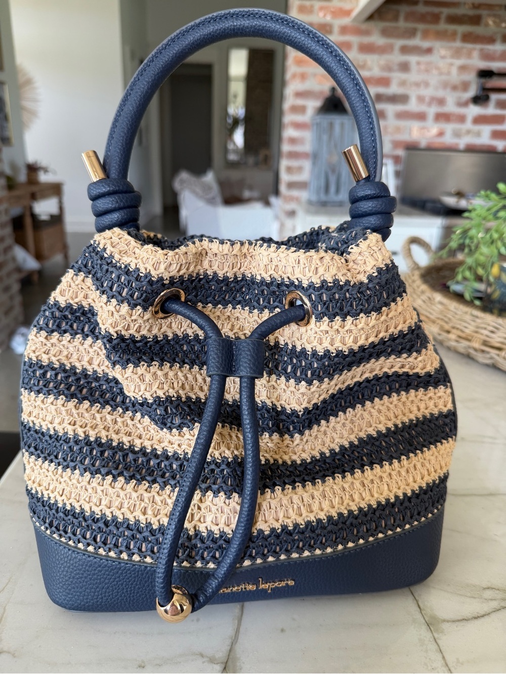 Nanette Lepore Navy and Natural Striped Straw Bucket Drawstring Bag